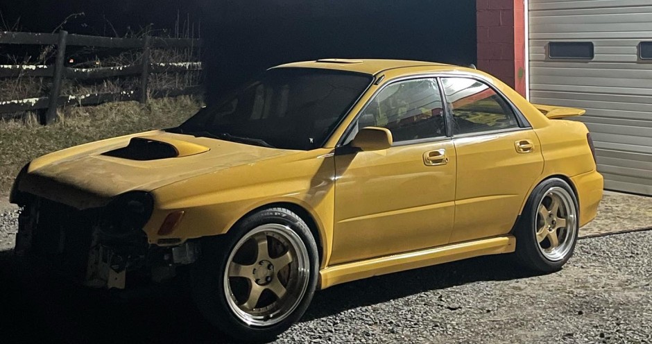 Tyler Surratt's 2003 Impreza WRX Sonic Yellow 2.0 wrx