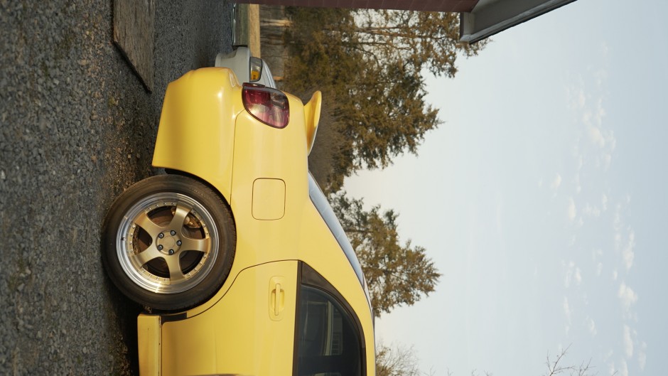 Tyler Surratt's 2003 Impreza WRX Sonic Yellow 2.0 wrx