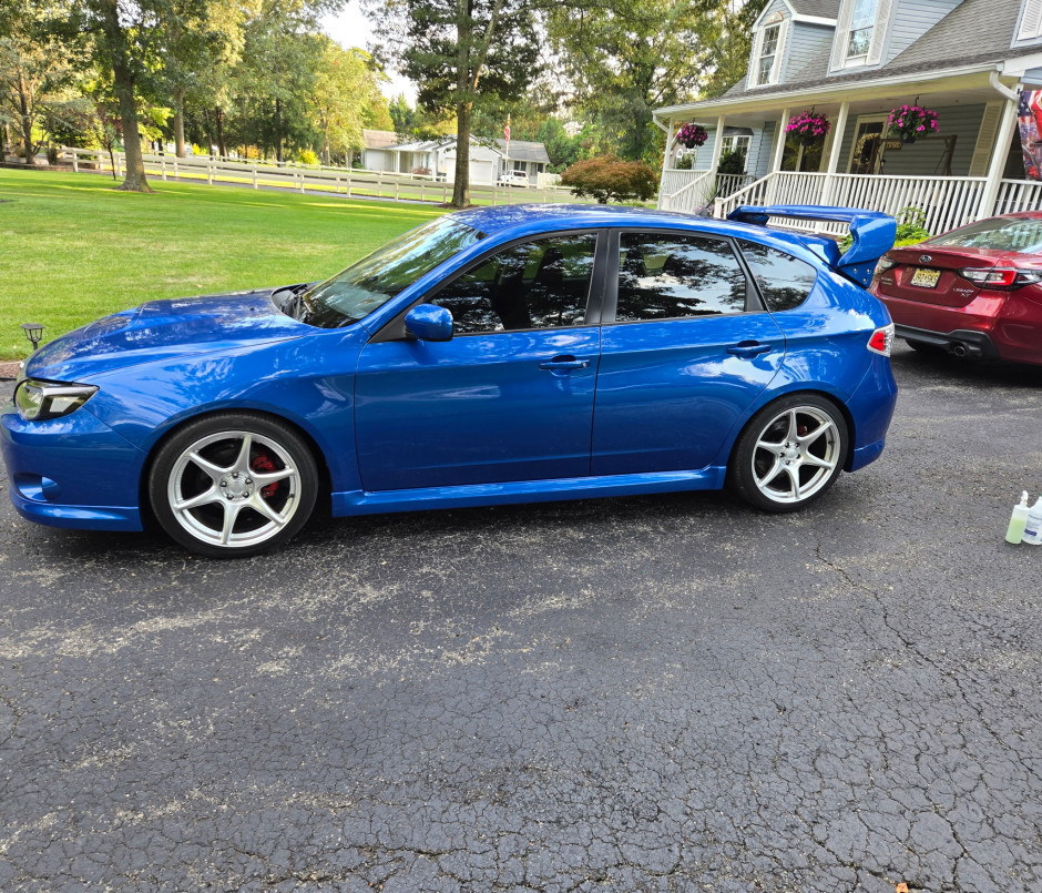 Chase  K's 2011 Impreza 2.5i It was an outback sport trim. Was painted