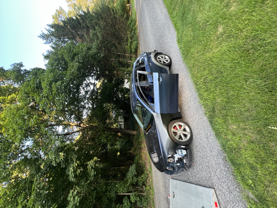 Chase  K's 2011 Impreza 2.5i It was an outback sport trim. Was painted