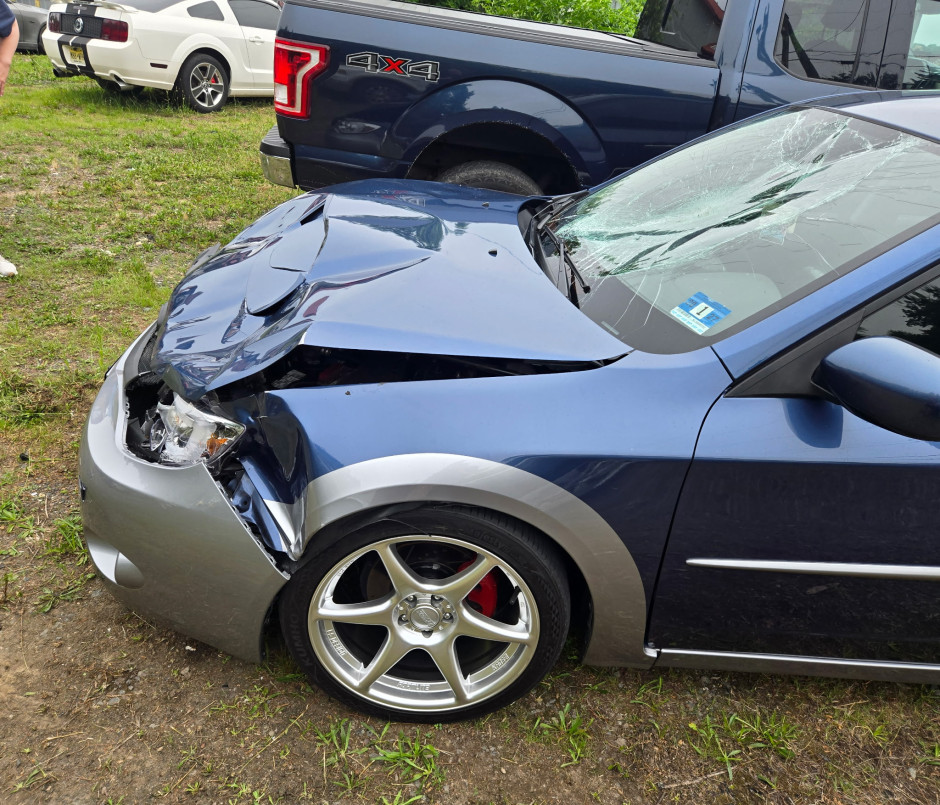 Chase  K's 2011 Impreza 2.5i It was an outback sport trim. Was painted