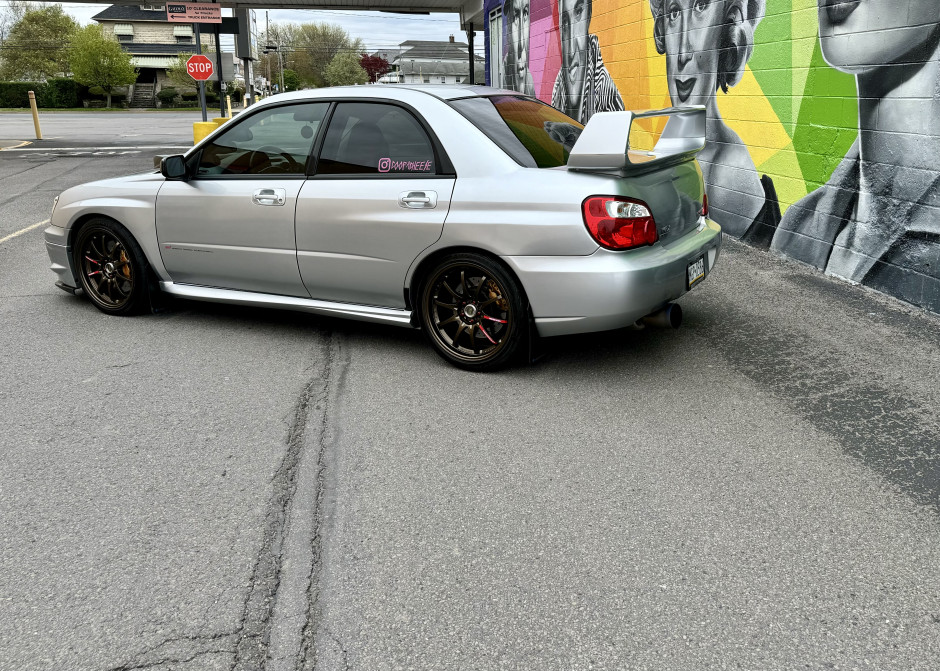 Cooper S's 2004 Impreza sti