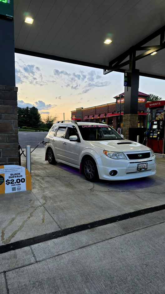Lars N's 2013 Forester 2.5X Limited JDM Sti skirts and front under spoiler paint matched